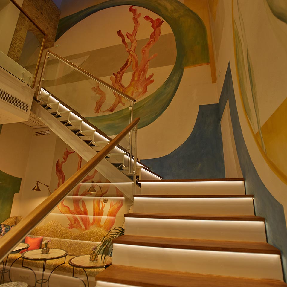 Decoration and design on the stairs of the El Escondite hotel