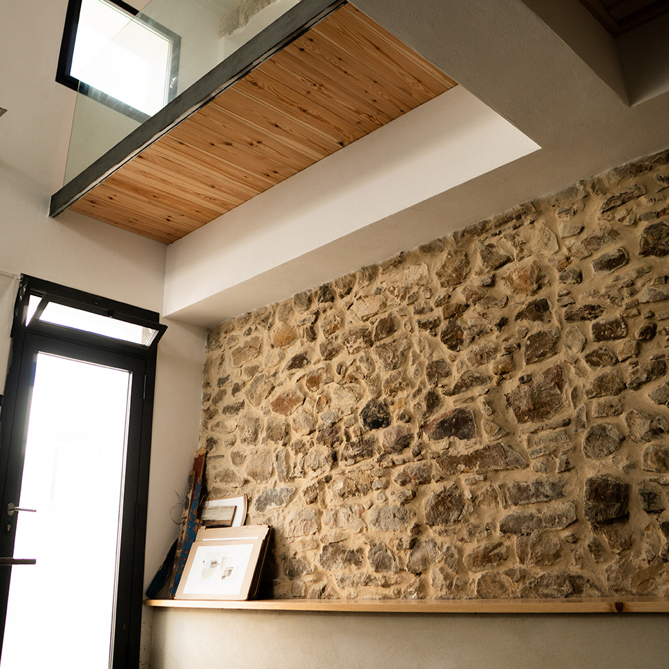 Workshop interior with exposed stone walls